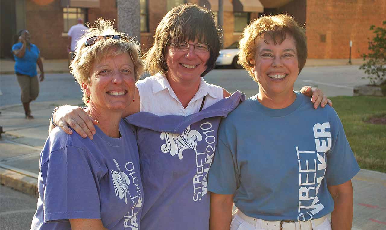 People at Lakewood Streetwalk wearing t-shirts from various years